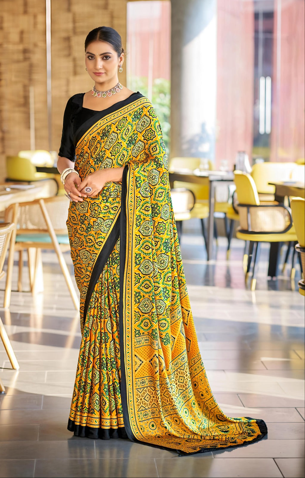Yellow Bandhani Print Saree with Black Border – Traditional Festive Wear