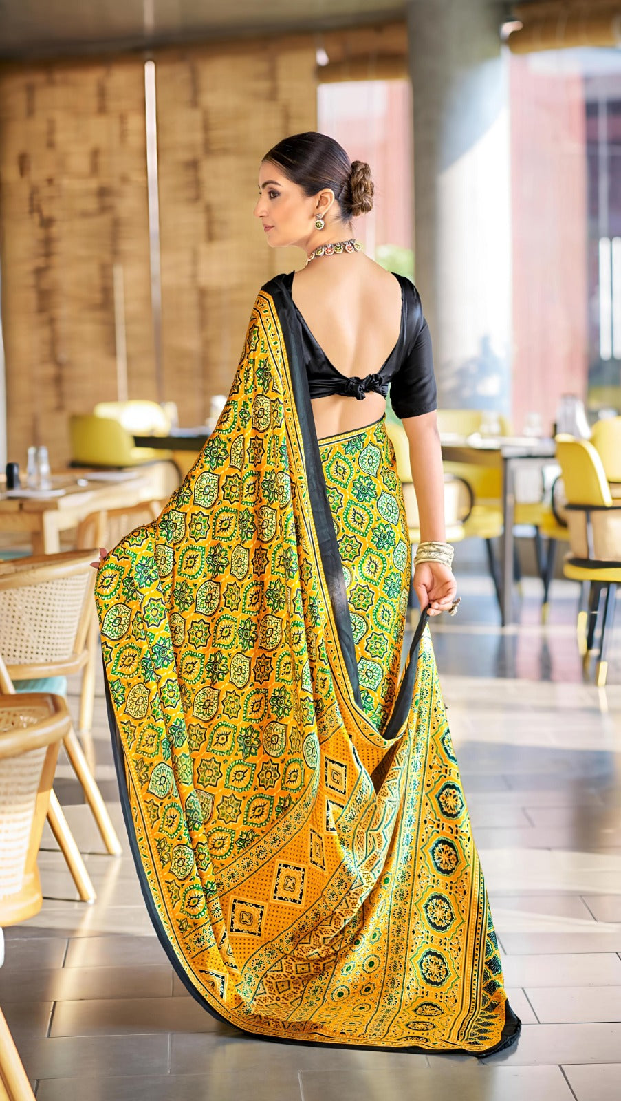 Yellow Bandhani Print Saree with Black Border – Traditional Festive Wear