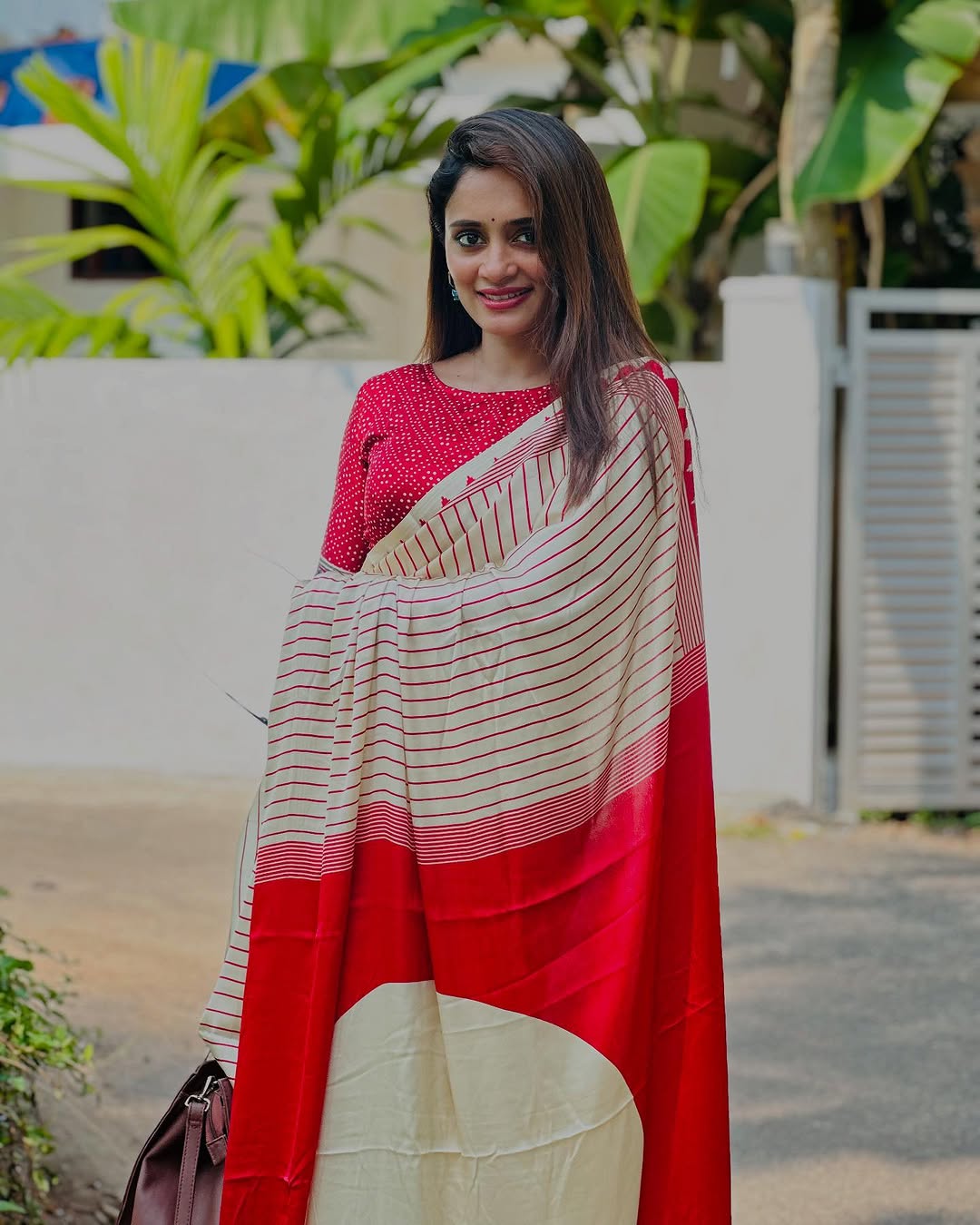 Crimson Elegance Geometric Saree