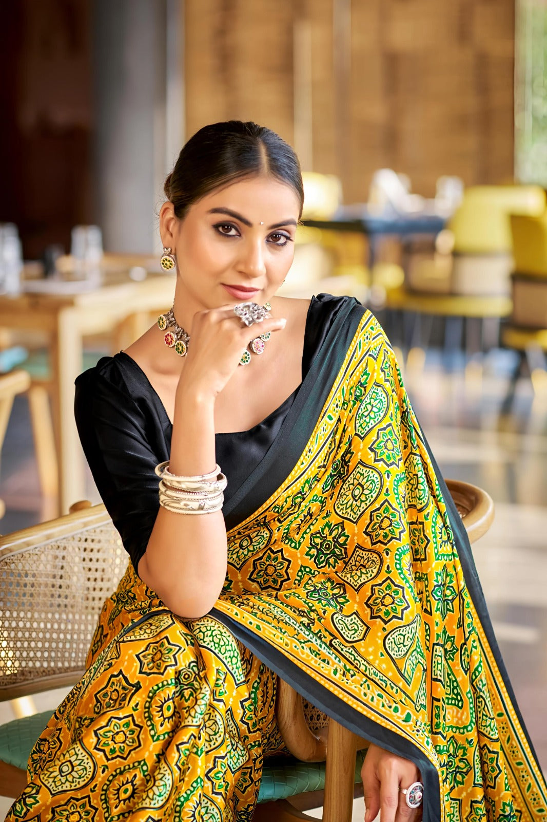 Yellow Bandhani Print Saree with Black Border – Traditional Festive Wear