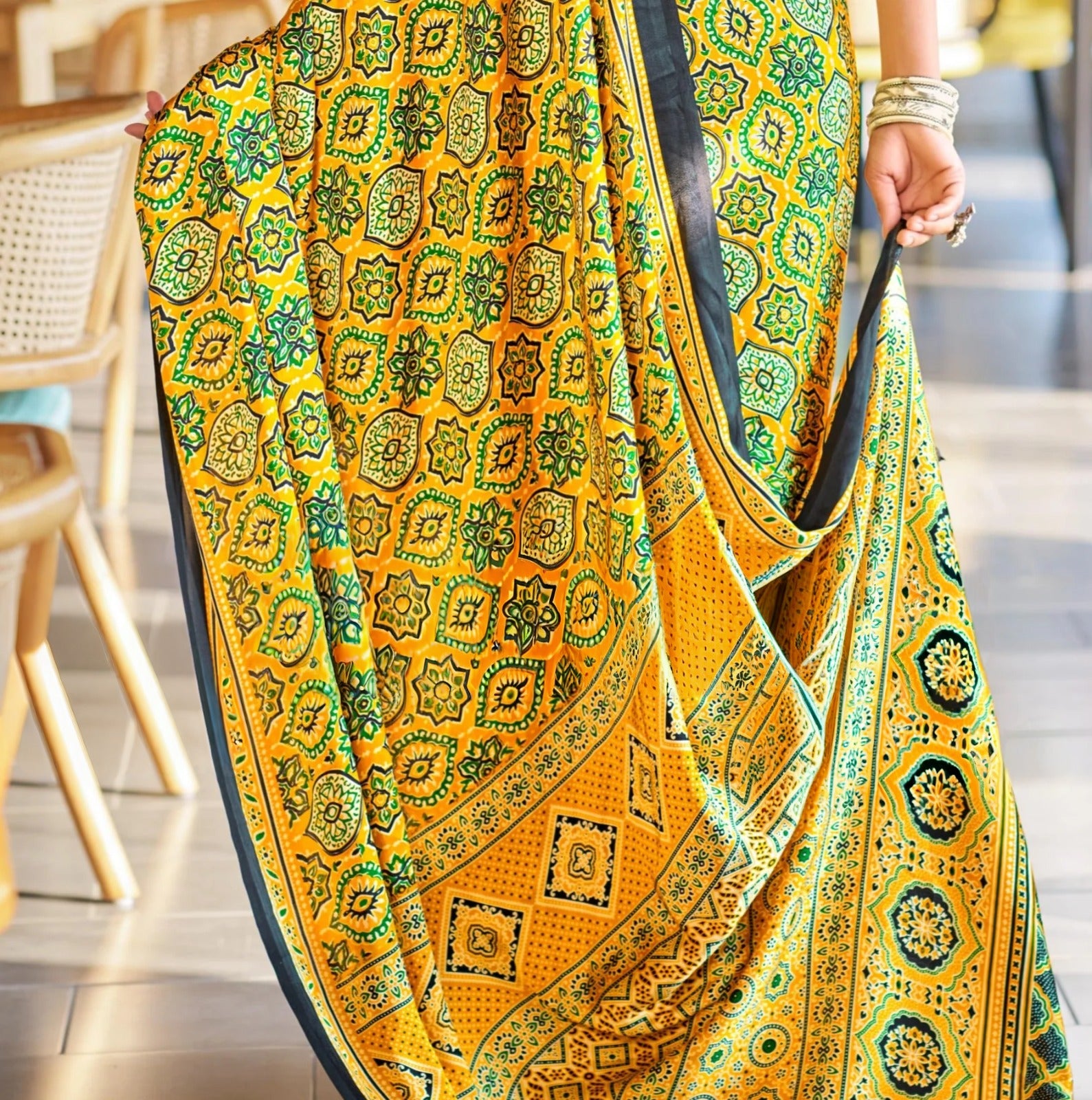 Yellow Bandhani Print Saree with Black Border – Traditional Festive Wear