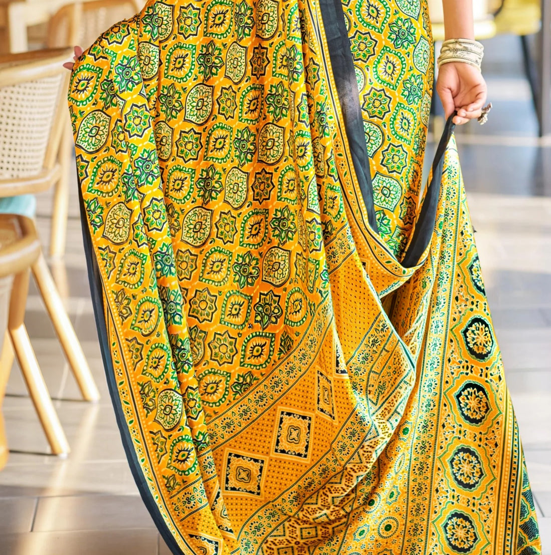 Yellow Bandhani Print Saree with Black Border – Traditional Festive Wear