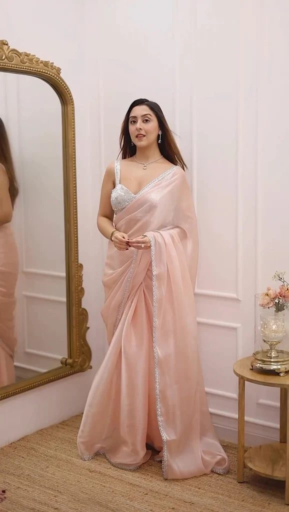 Pastel Peach Organza Saree with Silver Lace Border