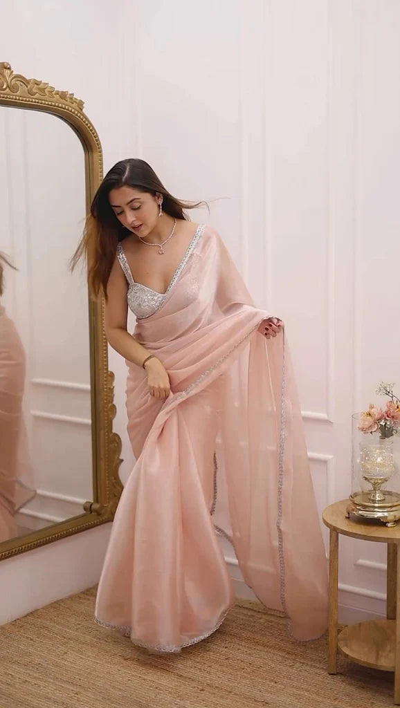 Pastel Peach Organza Saree with Silver Lace Border