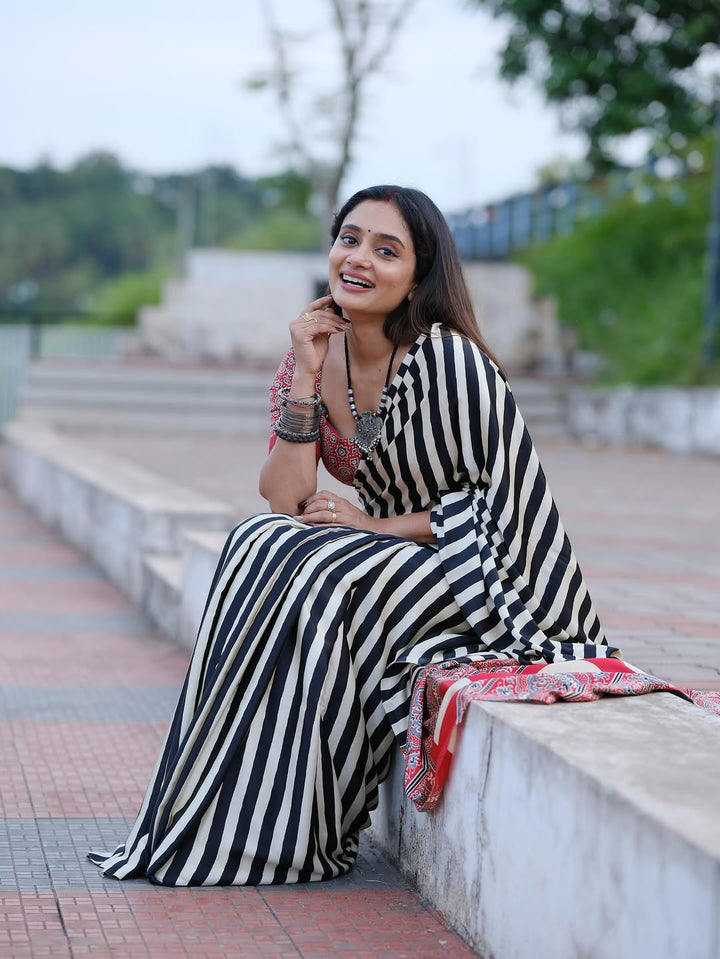 Black & White Striped Saree with Red Ajrakh Border – Elegant Ethnic Wear